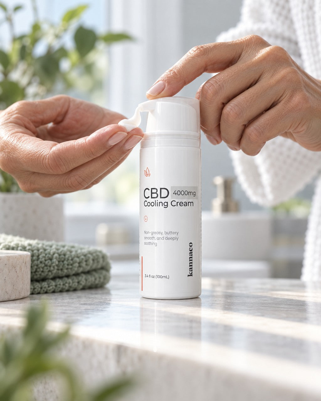 A hand pressing the pump on a bottle of Cooling Cream